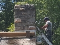 Affordable Mason pointing and repairing chimney